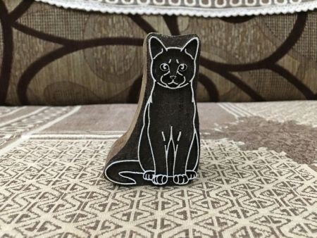 A sitting cat pottery stamp ceramic mould scrapbooking tjap batik printing floral carved stamps.