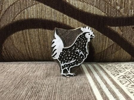 A rooster ,pottery stamp ceramic mould scrapbooking tjap batik printing floral carved stamps.